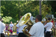 Man Playing Sousaphone in Parade.